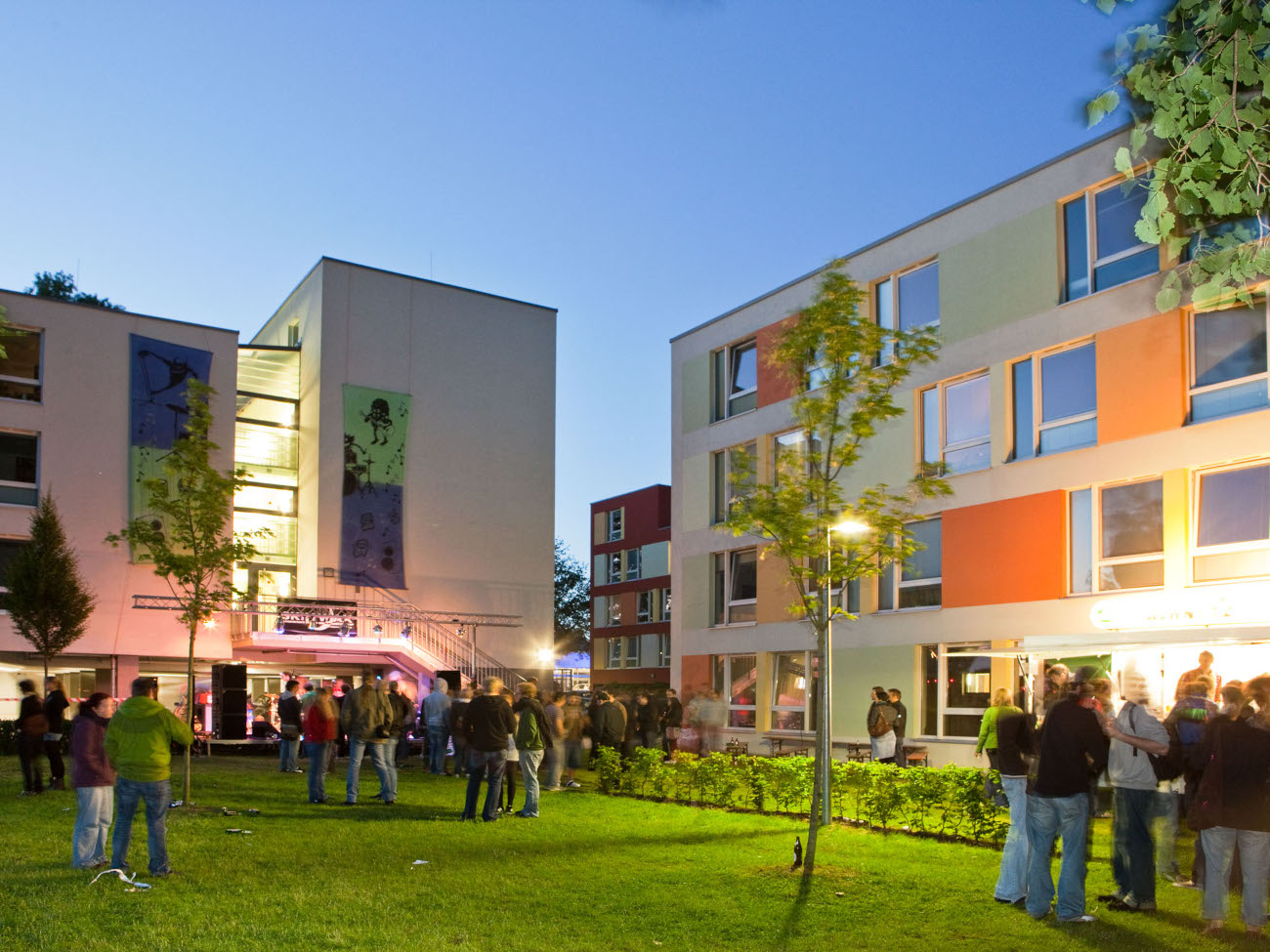 Exterior view of a student residence during an event.