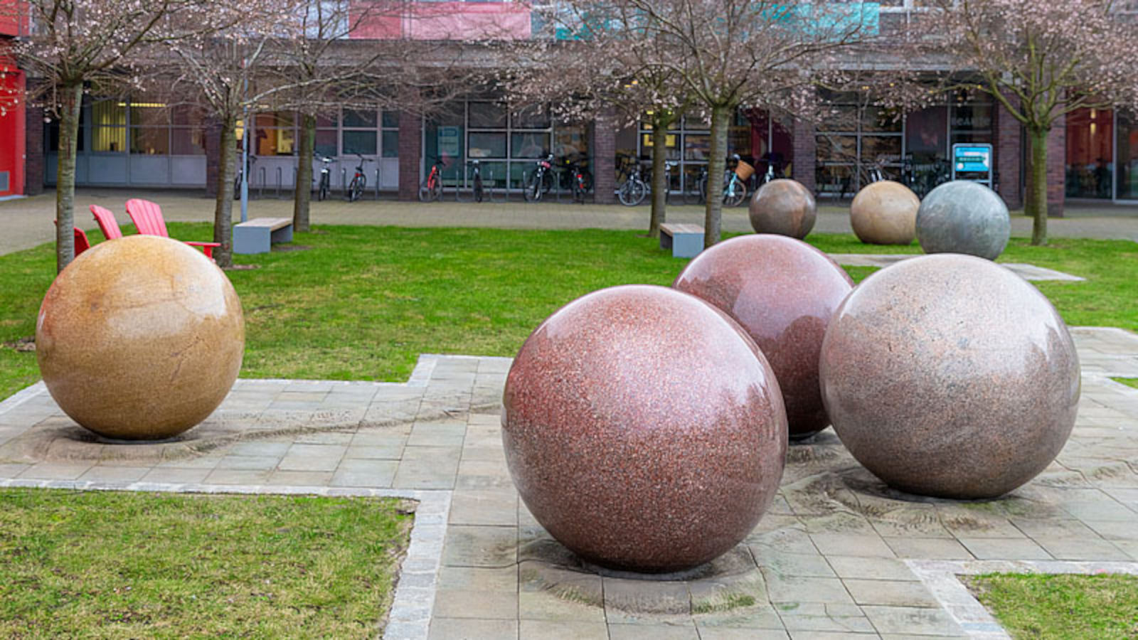 A sculpture comprising eight large granite balls in front of the university’s Administration Building.