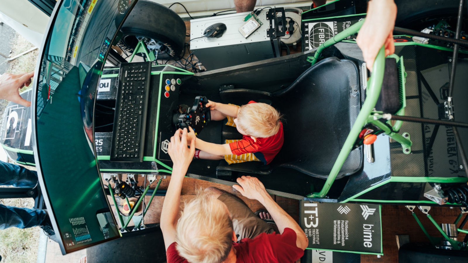 A boy sitting in a kart