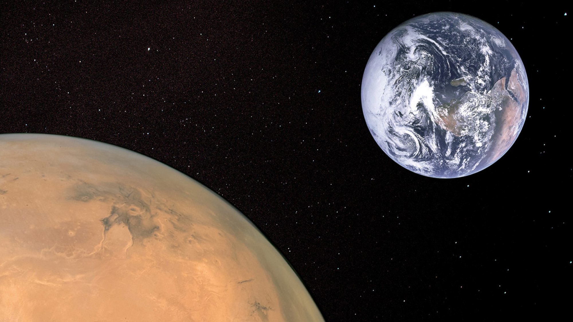 The planet Mars with the Earth in the background.