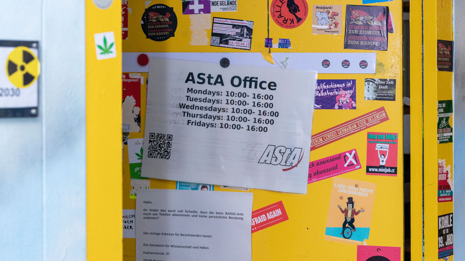 Door of the AStA Student's Union with many stickers
