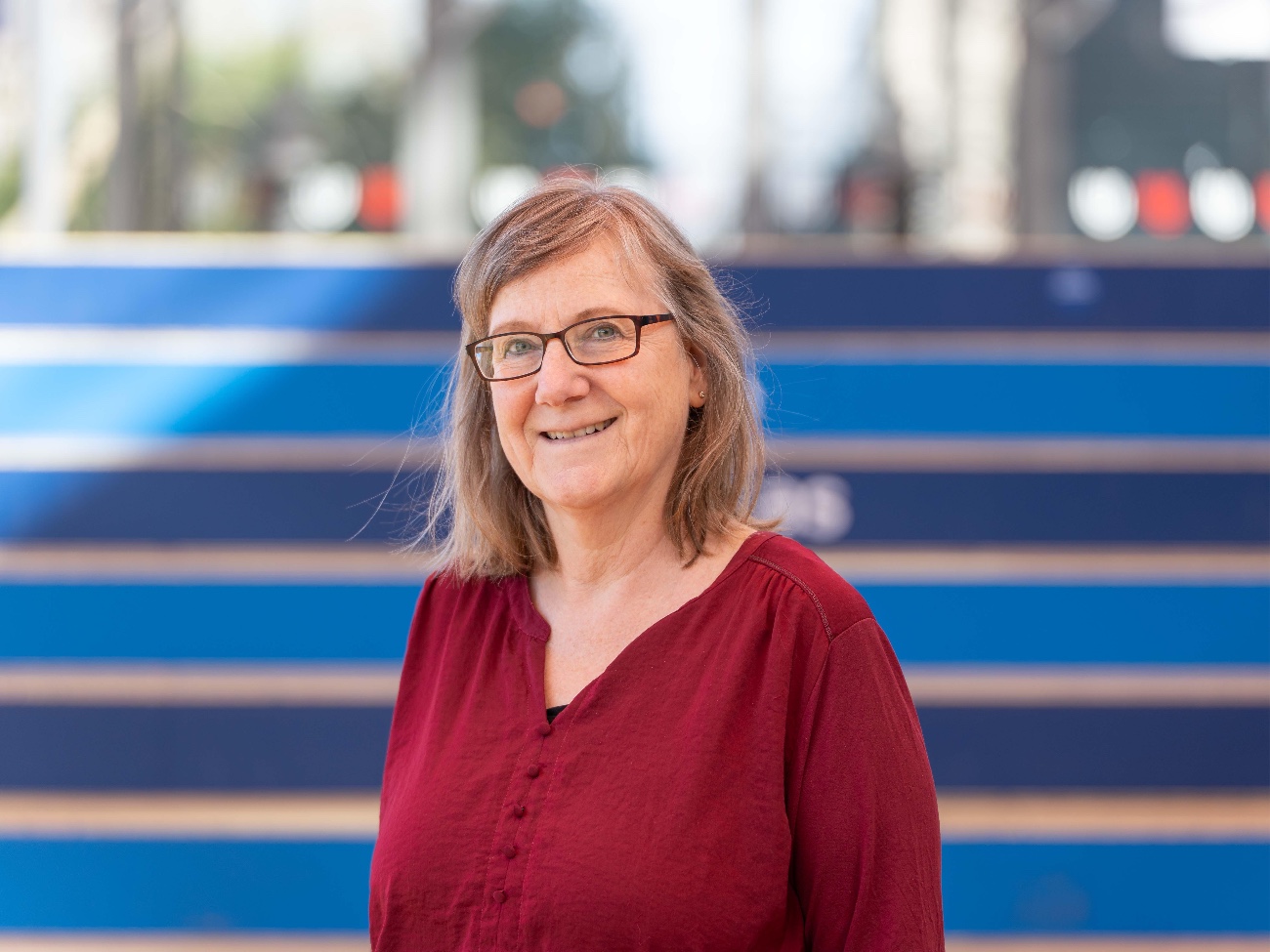 A portrait photo of Claudia Pellegrino smiling
